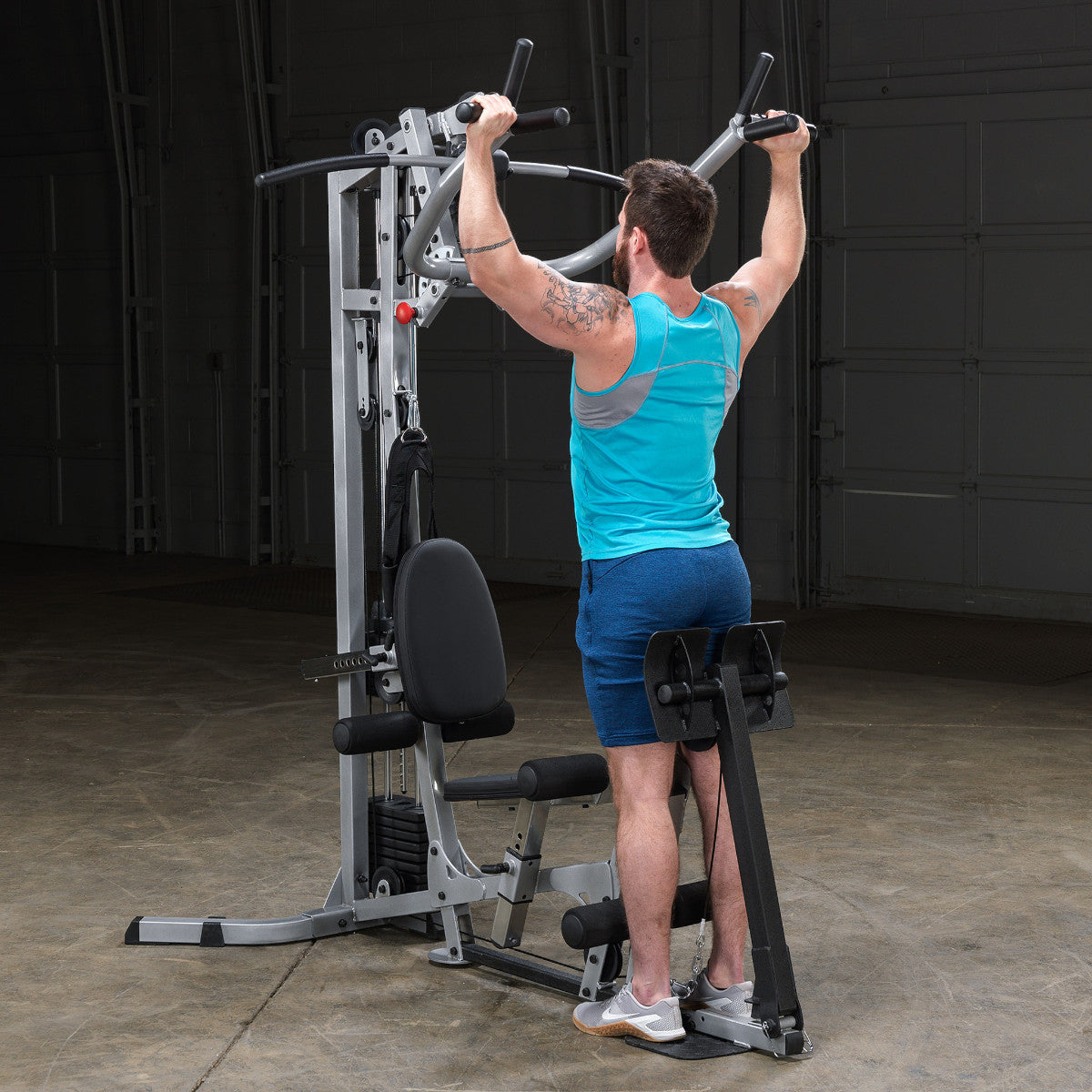 Body-Solid Powerline BSG10X Multi-Station Home Gym exercise