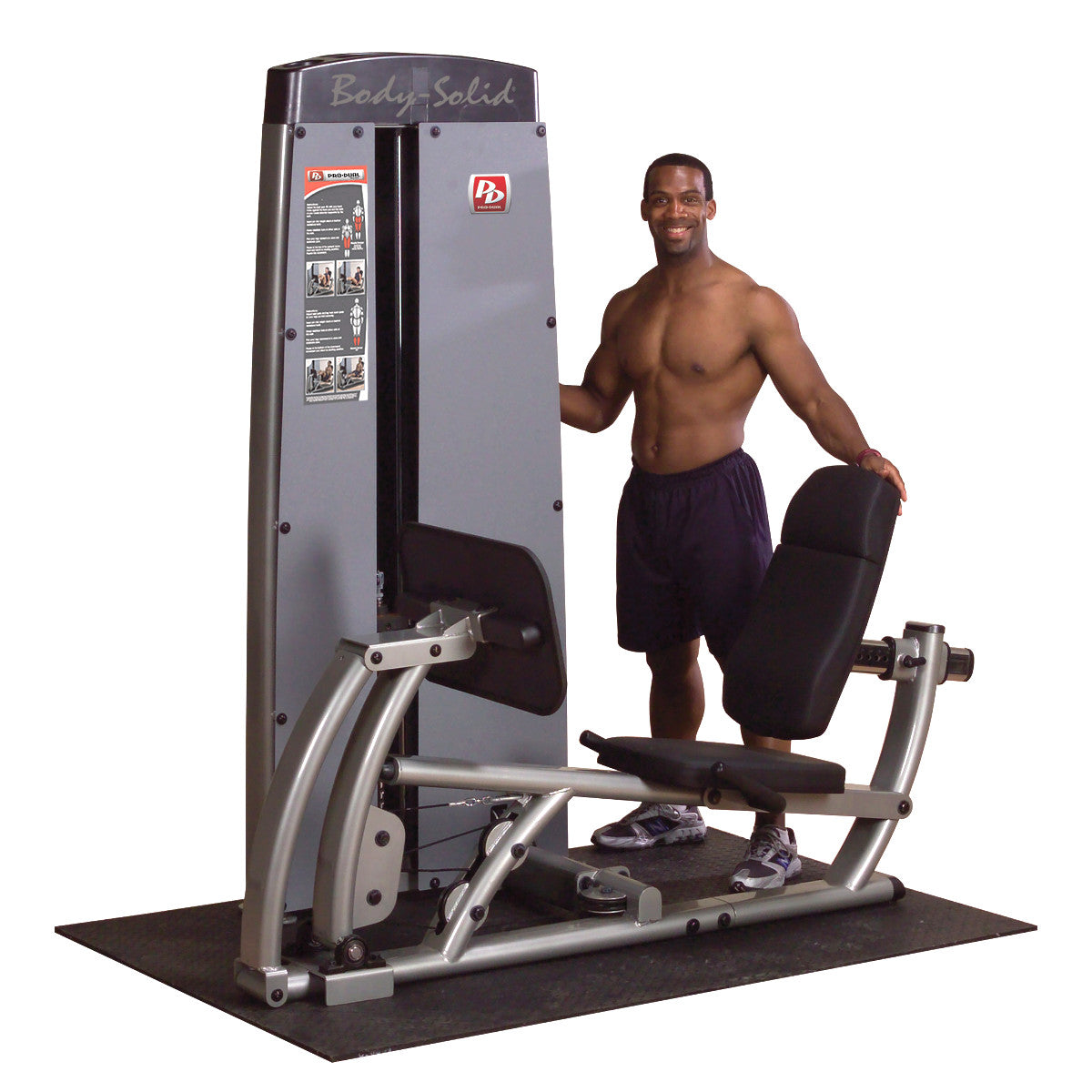 Body-Solid DCLPSF ProDual Leg Calf Press Machine in room with man