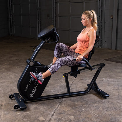 Body-Solid Endurance B4RB Recumbent Bike woman exercising