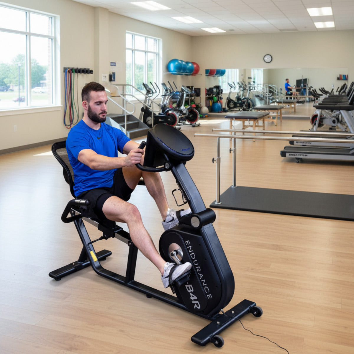 Body-Solid Endurance B4RB Recumbent Bike man exercising