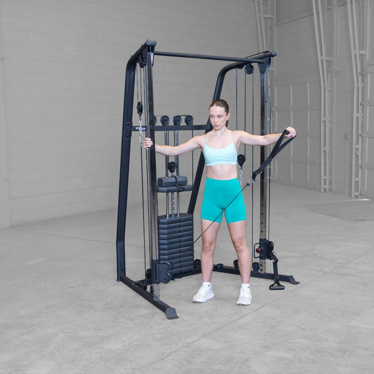 Best Fitness BFFT10B Functional Trainer girl exercising