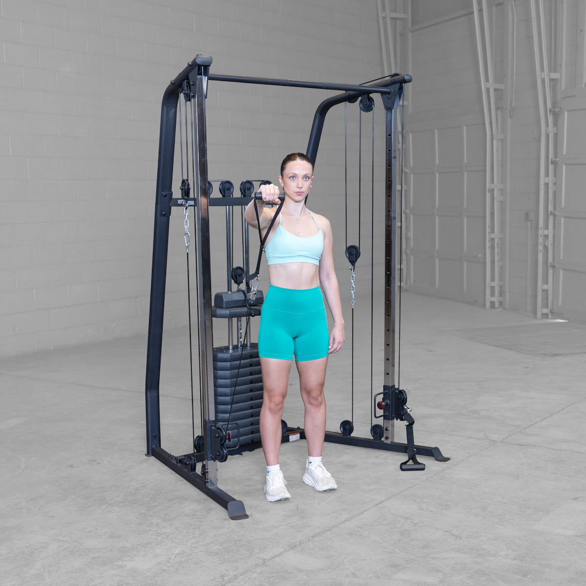 Best Fitness BFFT10B Functional Trainer girl exercising