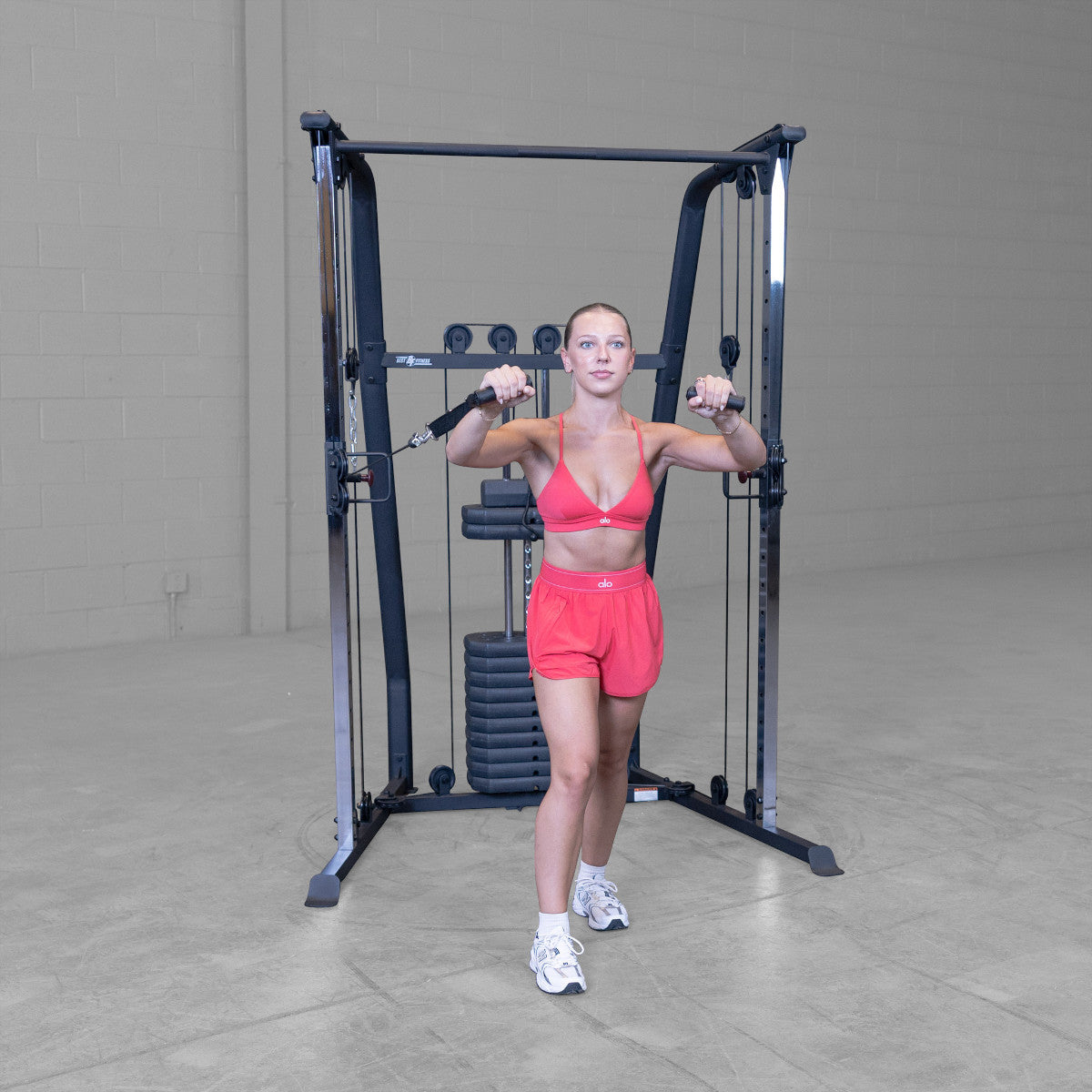 Best Fitness BFFT10B Functional Trainer girl exercising