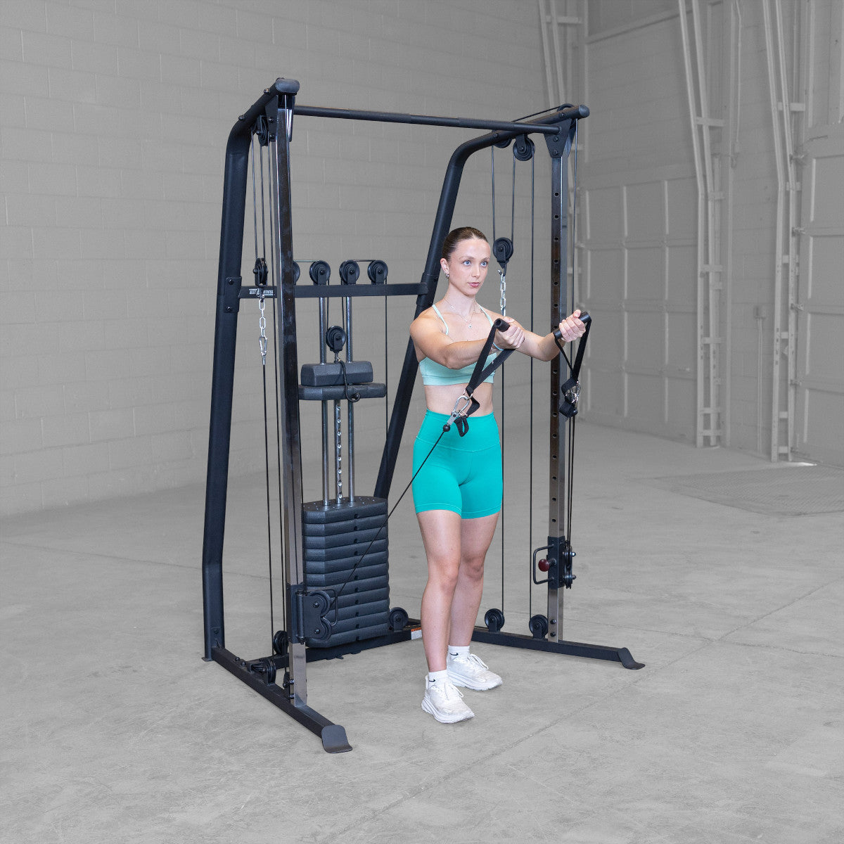 Best Fitness BFFT10B Functional Trainer girl exercising