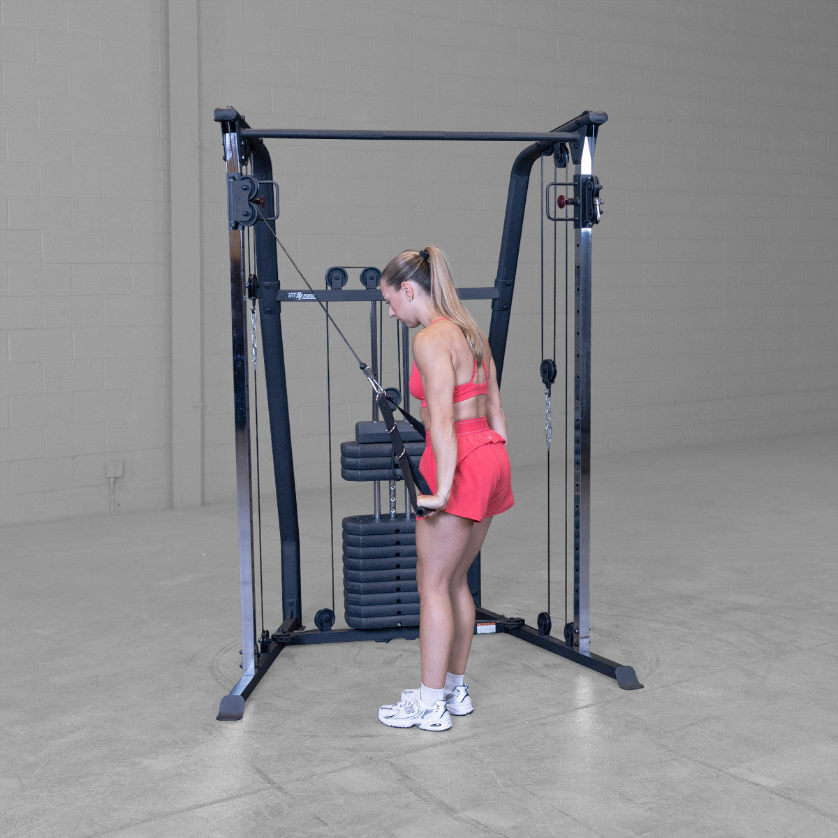 Best Fitness BFFT10B Functional Trainer girl exercising