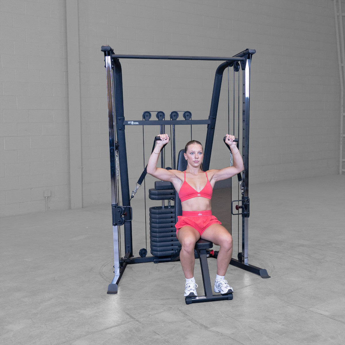 Best Fitness BFFT10B Functional Trainer girl exercising