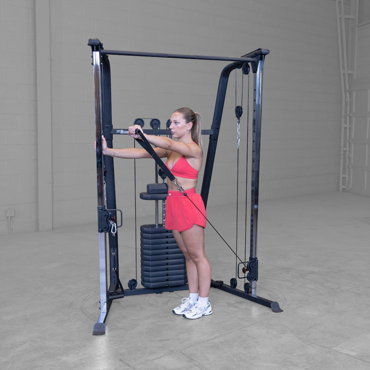 Best Fitness BFFT10B Functional Trainer girl exercising