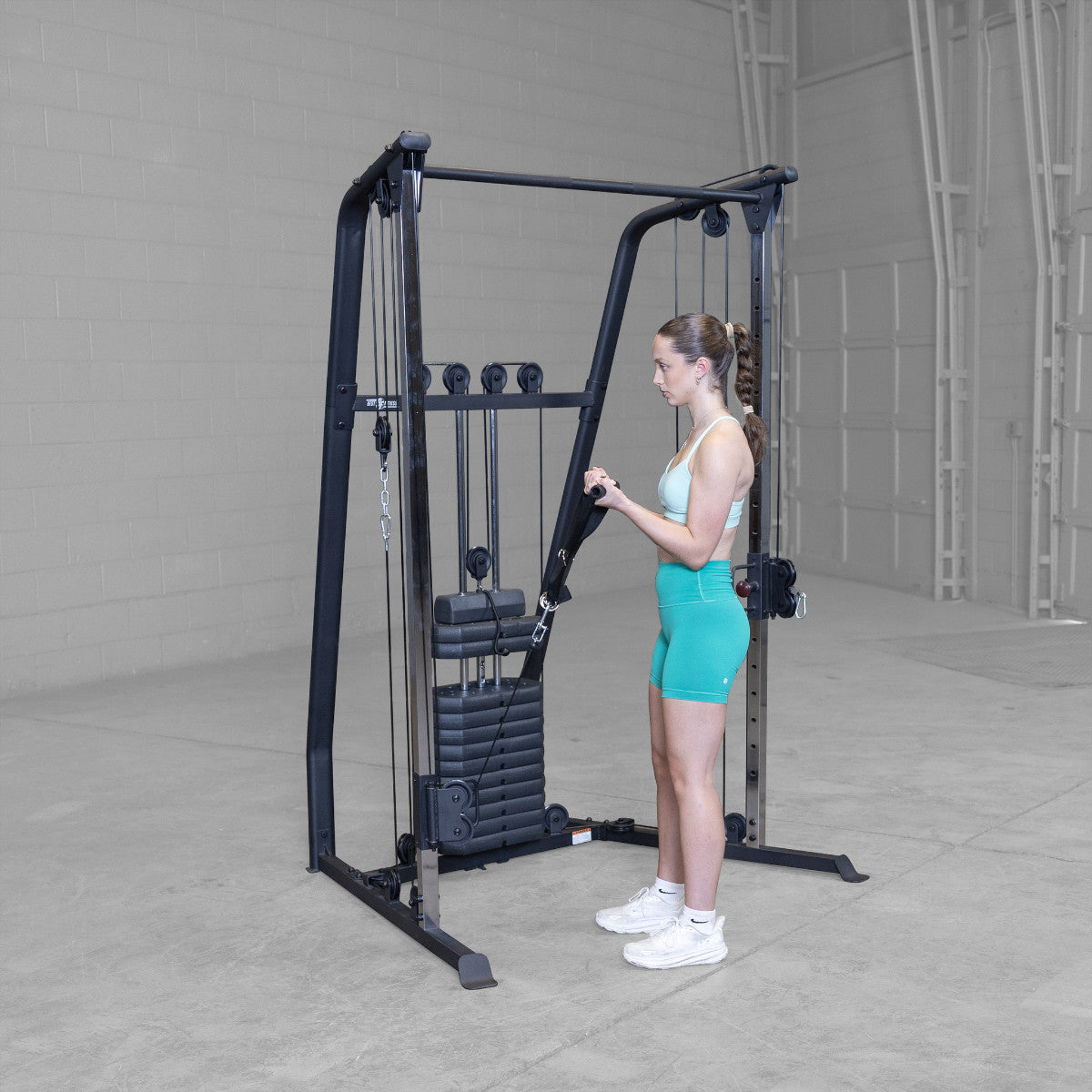 Best Fitness BFFT10B Functional Trainer girl exercising
