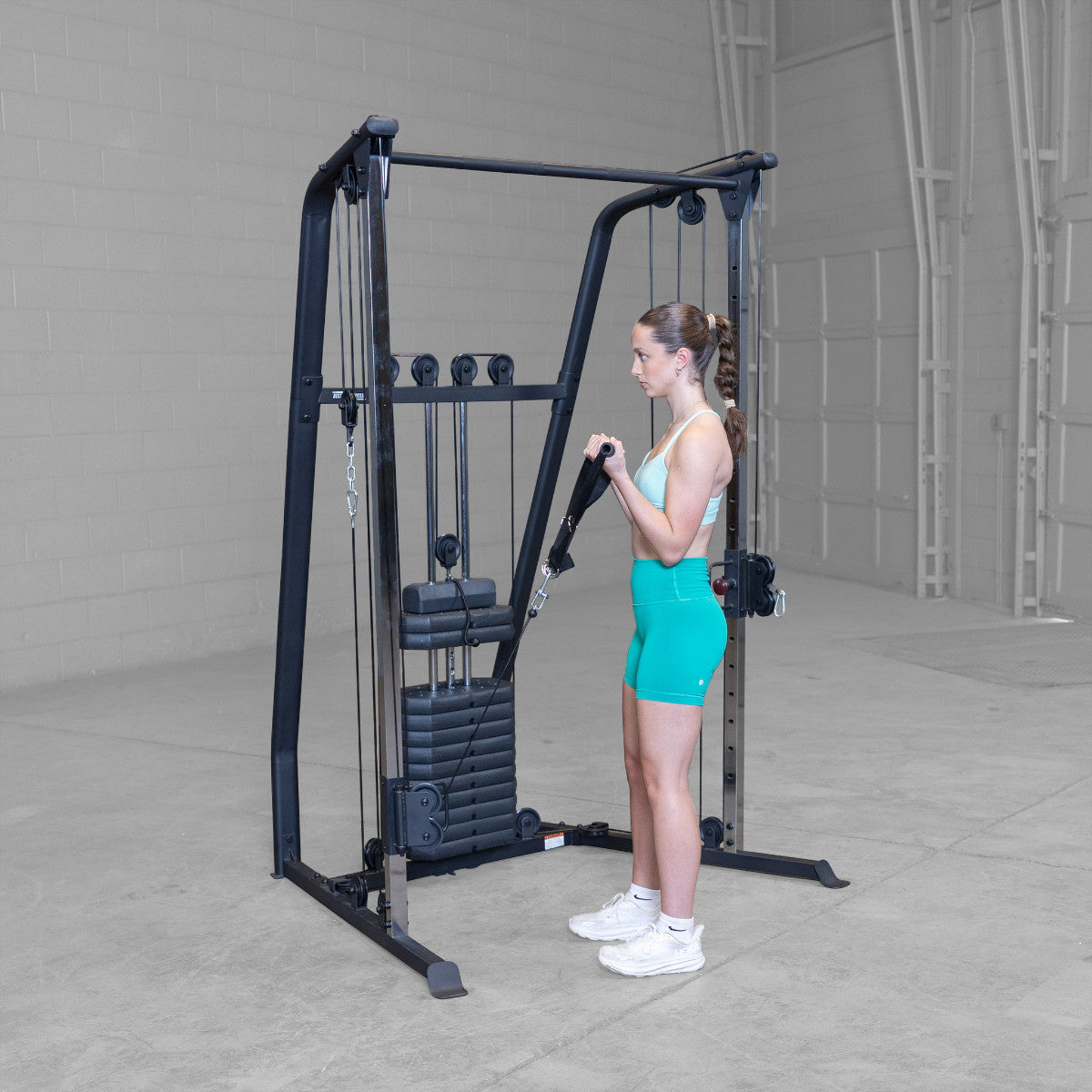 Best Fitness BFFT10B Functional Trainer girl exercising