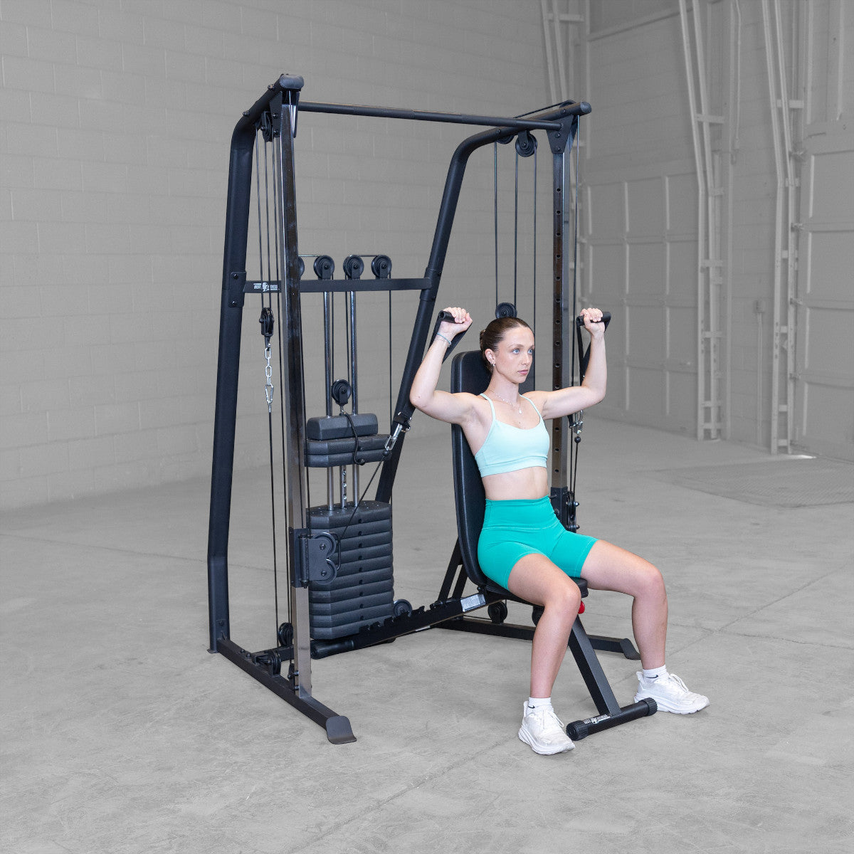 Best Fitness BFFT10B Functional Trainer girl exercising