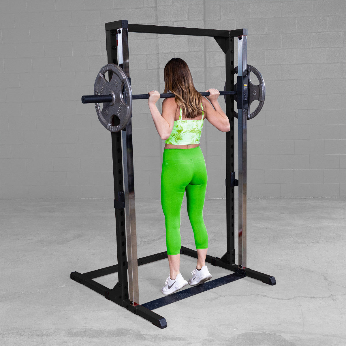 Body-Solid BFSM250B Best Fitness Smith Machine woman exercising