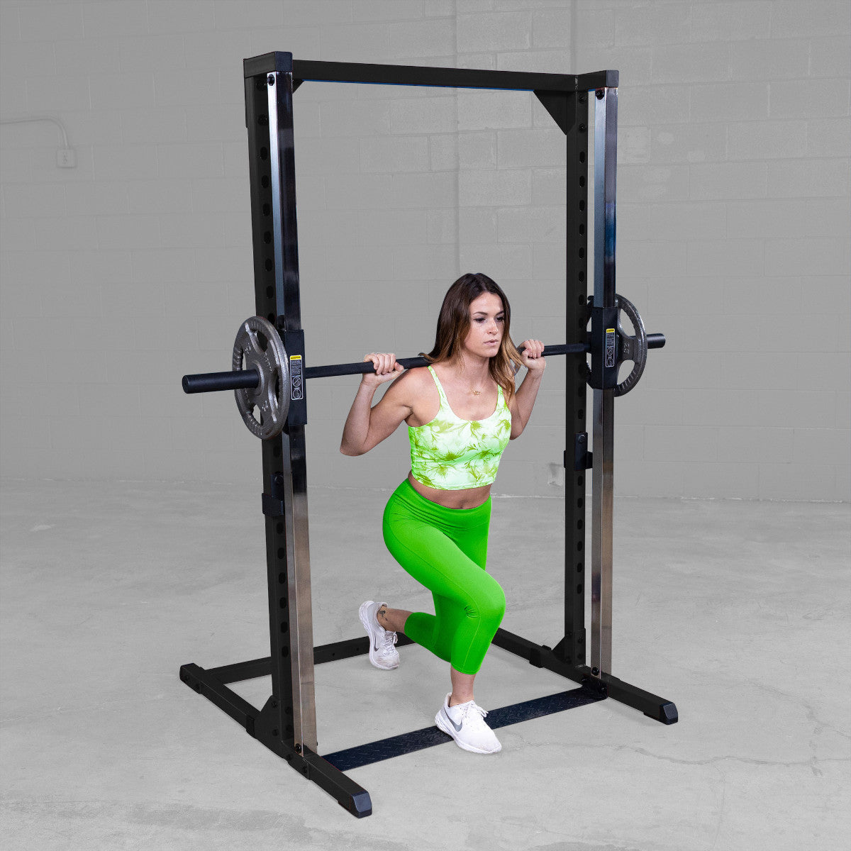 Body-Solid BFSM250B Best Fitness Smith Machine woman exercising