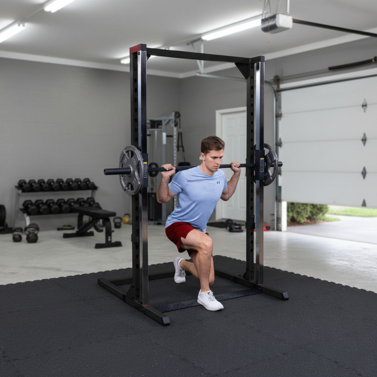 Body-Solid BFSM250B Best Fitness Smith Machine man exercising in garage gym