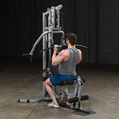 Body-Solid Powerline BSG10X Multi-Station Home Gym exercise