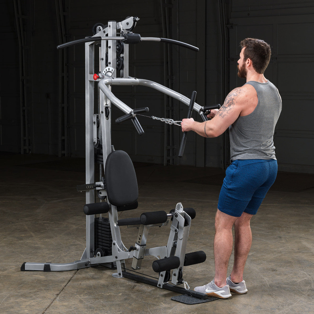 Body-Solid Powerline BSG10X Multi-Station Home Gym exercise