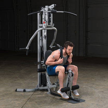 Body-Solid Powerline BSG10X Multi-Station Home Gym exercise