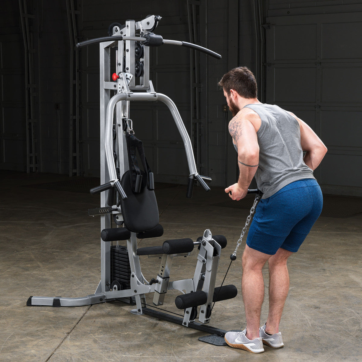Body-Solid Powerline BSG10X Multi-Station Home Gym exercise