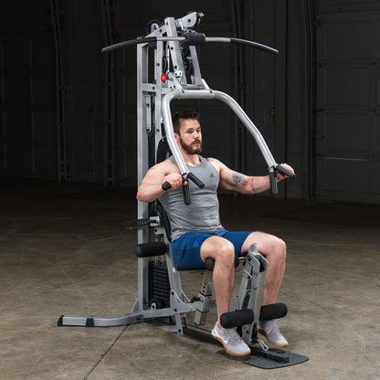 Body-Solid Powerline BSG10X Multi-Station Home Gym exercise