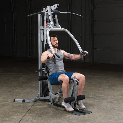 Body-Solid Powerline BSG10X Multi-Station Home Gym exercise