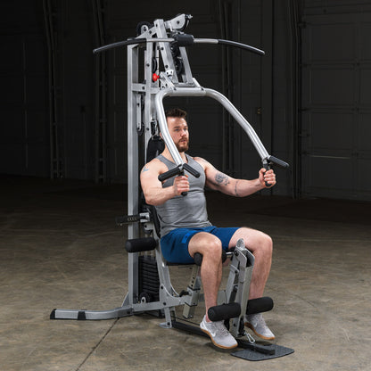 Body-Solid Powerline BSG10X Multi-Station Home Gym exercise