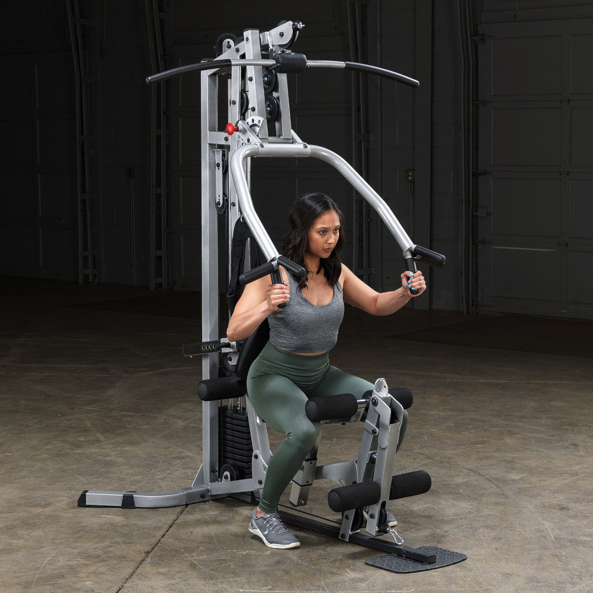 Body-Solid Powerline BSG10X Multi-Station Home Gym exercise