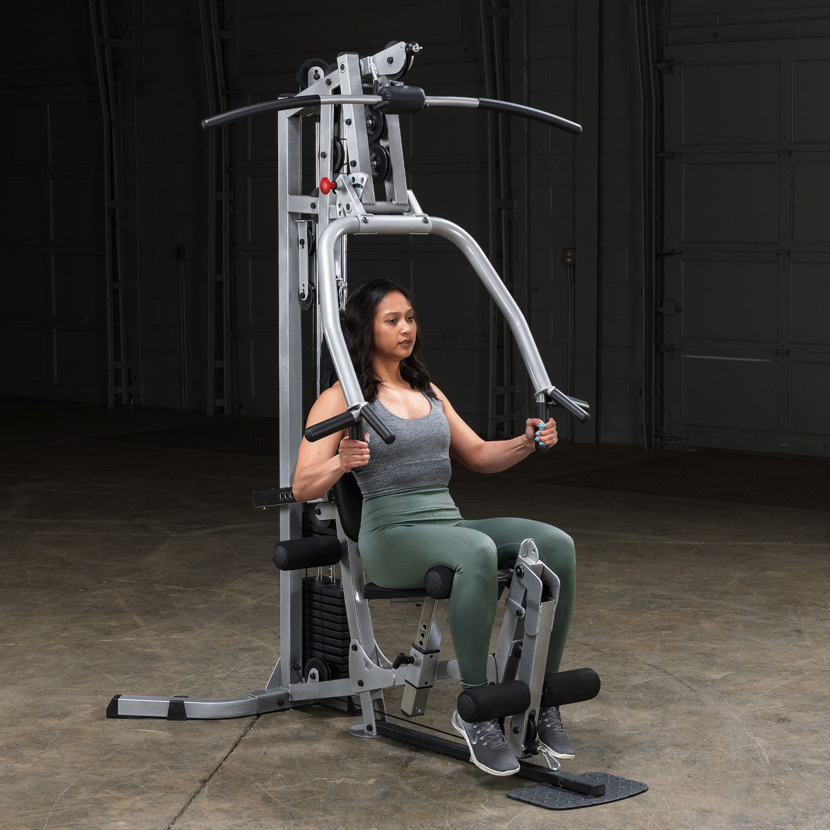 Body-Solid Powerline BSG10X Multi-Station Home Gym exercise