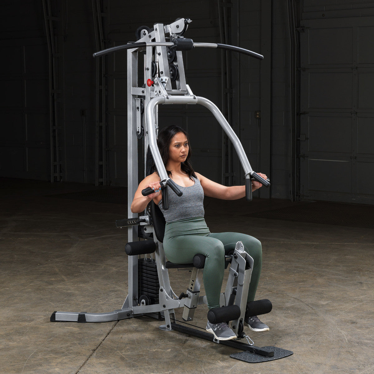 Body-Solid Powerline BSG10X Multi-Station Home Gym exercise