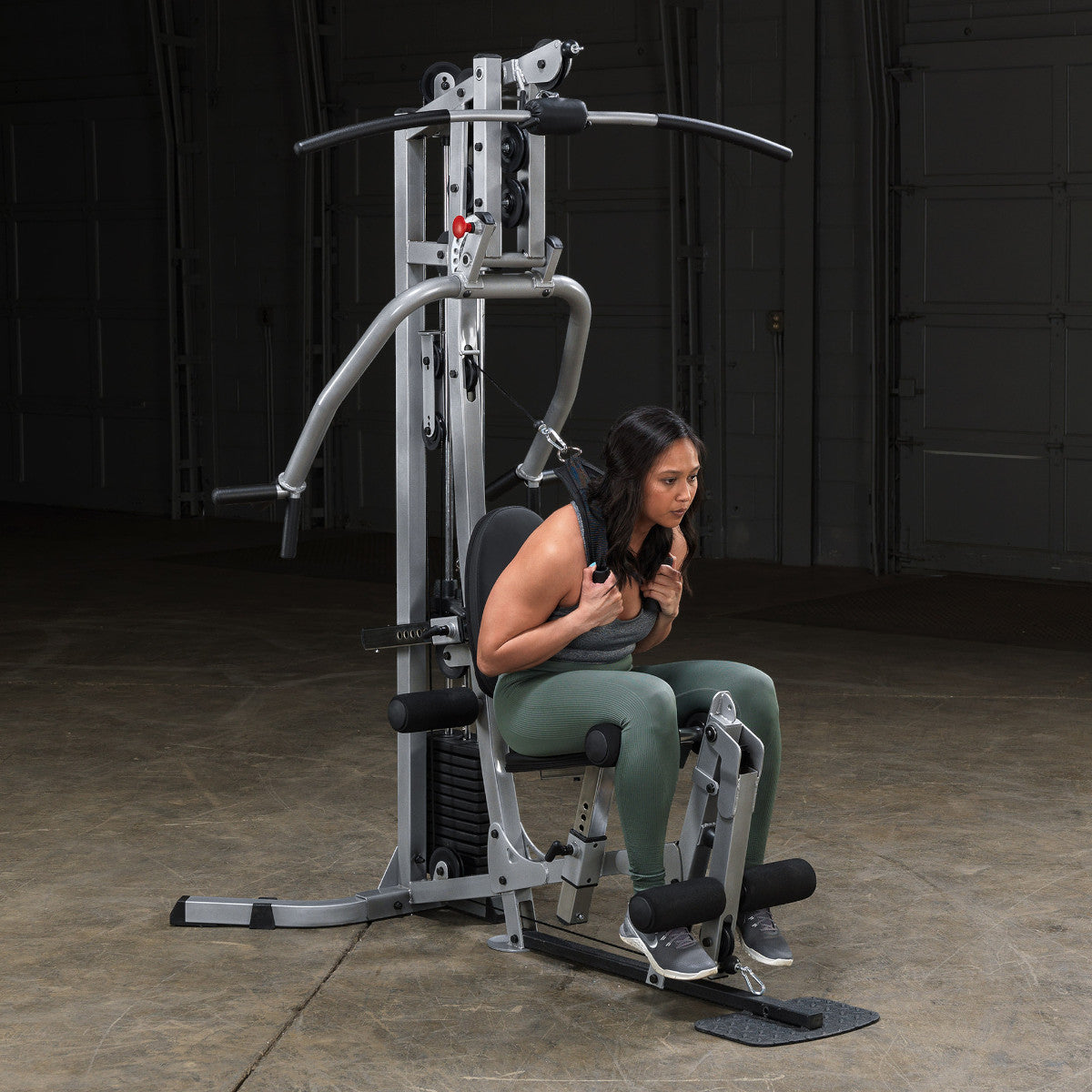 Body-Solid Powerline BSG10X Multi-Station Home Gym exercise