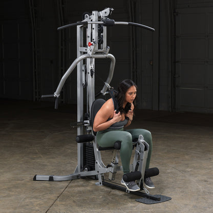 Body-Solid Powerline BSG10X Multi-Station Home Gym exercise