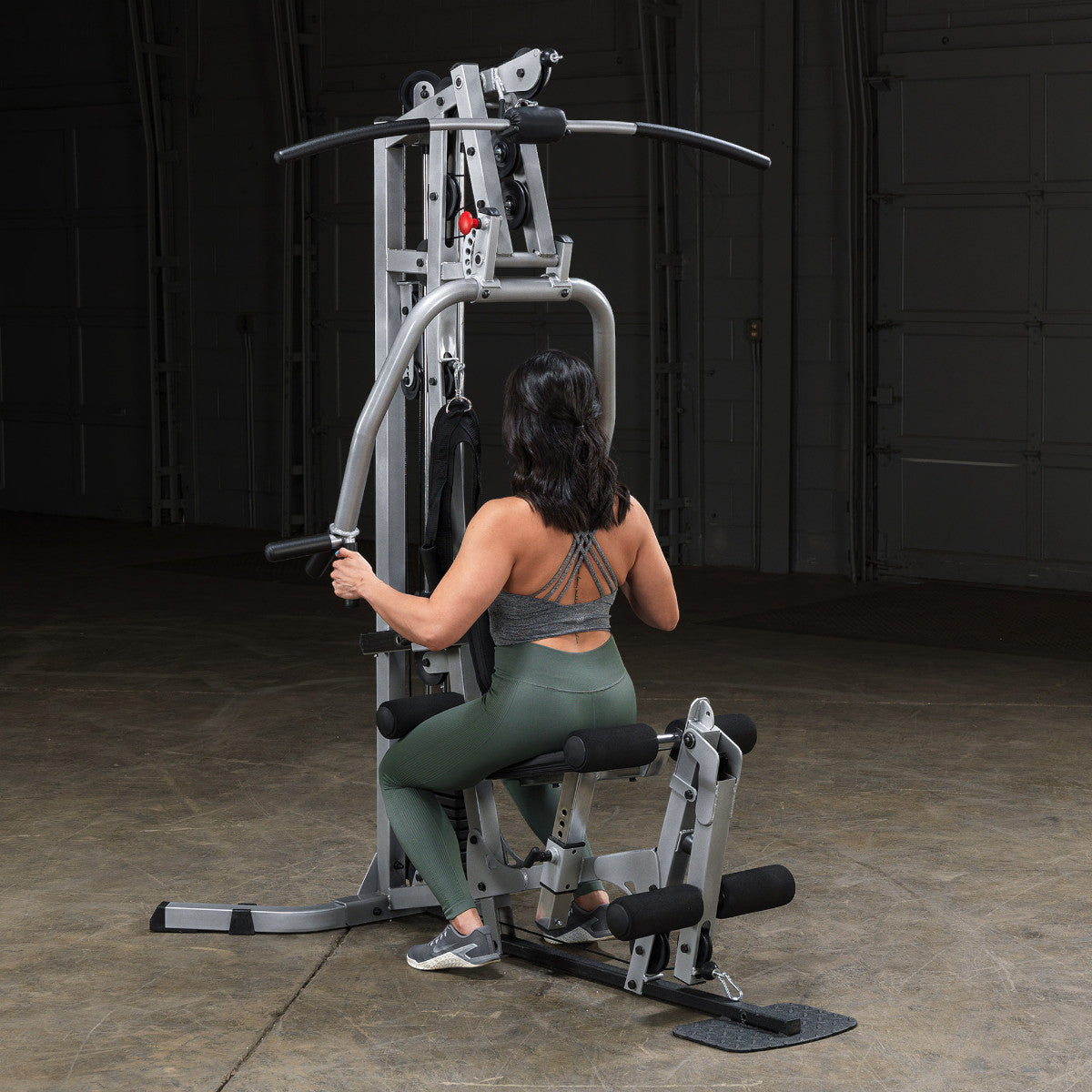 Body-Solid Powerline BSG10X Multi-Station Home Gym exercise