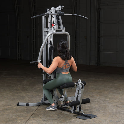 Body-Solid Powerline BSG10X Multi-Station Home Gym exercise