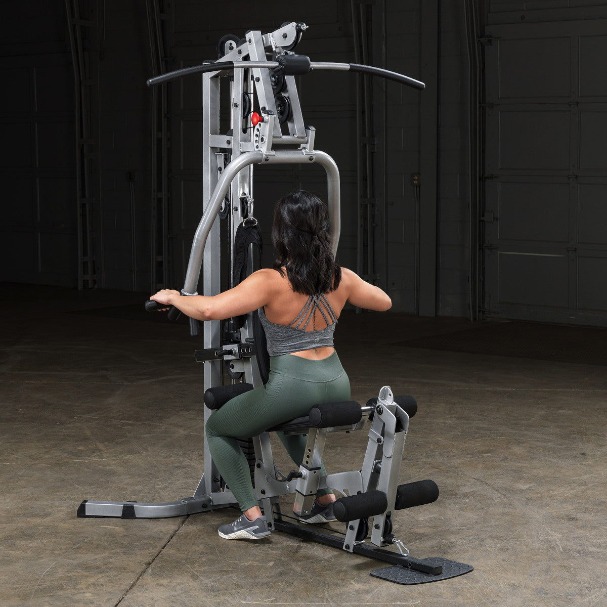 Body-Solid Powerline BSG10X Multi-Station Home Gym exercise