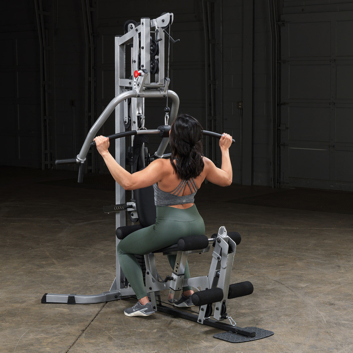Body-Solid Powerline BSG10X Multi-Station Home Gym exercise