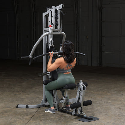 Body-Solid Powerline BSG10X Multi-Station Home Gym exercise