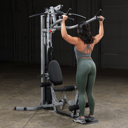 Body-Solid Powerline BSG10X Multi-Station Home Gym exercise