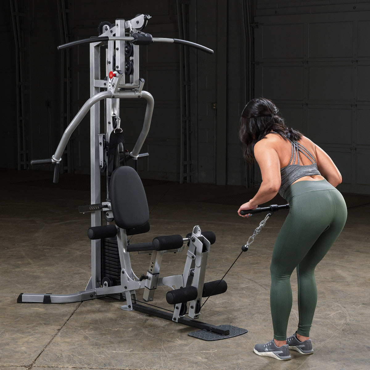 Body-Solid Powerline BSG10X Multi-Station Home Gym exercise