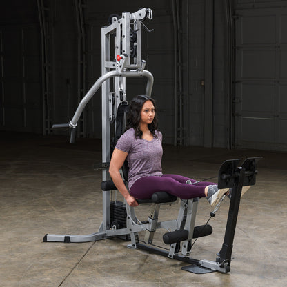 Body-Solid Powerline BSG10X Multi-Station Home Gym exercise