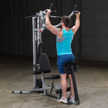 Body-Solid Powerline BSG10X Multi-Station Home Gym exercise