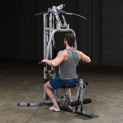 Body-Solid Powerline BSG10X Multi-Station Home Gym exercise