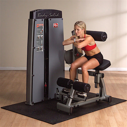 Body-Solid DABB ProDual Ab and Back Machine woman exercising
