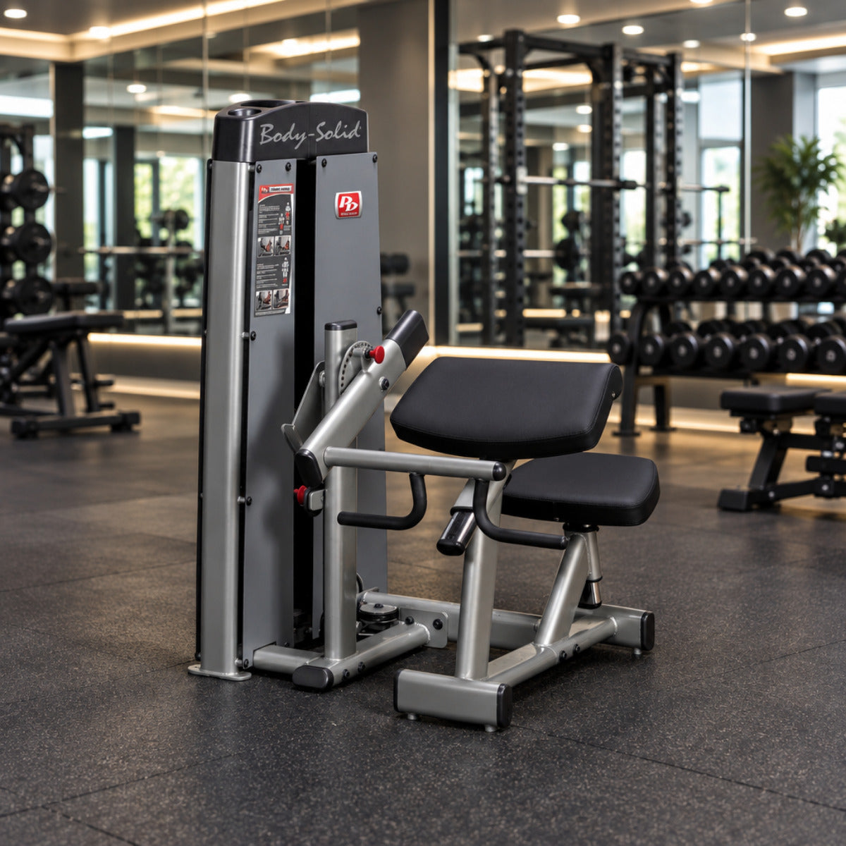 Body-Solid DBTCSF ProDual Biceps Triceps Machine in gym