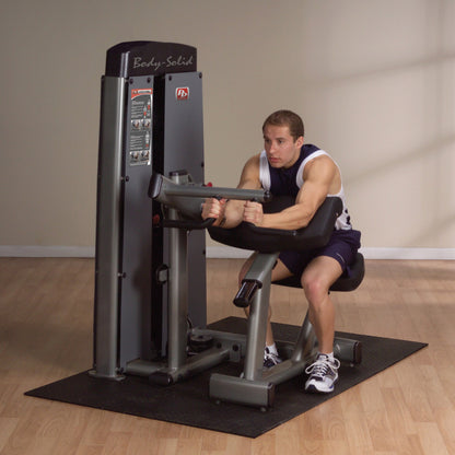 Body-Solid DBTCSF ProDual Biceps Triceps Machine man exercising