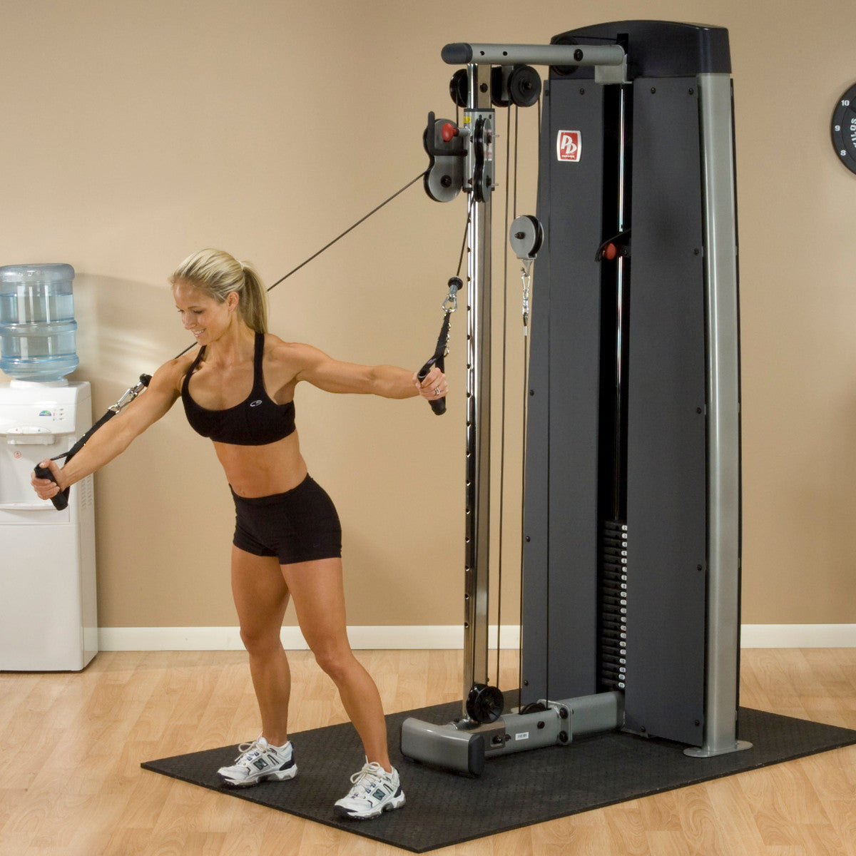Body-Solid ProDual DPCC Cable Column Machine woman exercising