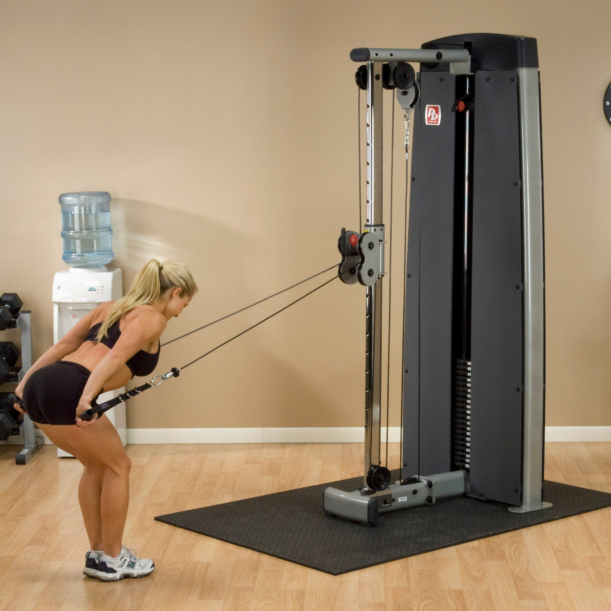 Body-Solid ProDual DPCC Cable Column Machine woman exercising