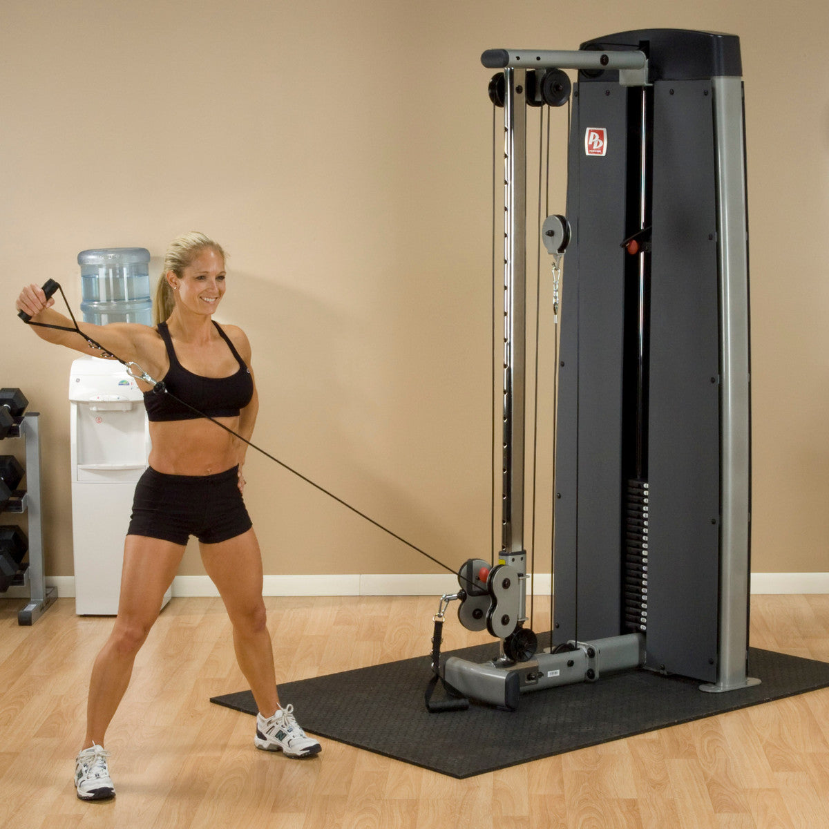 Body-Solid ProDual DPCC Cable Column Machine woman exercising