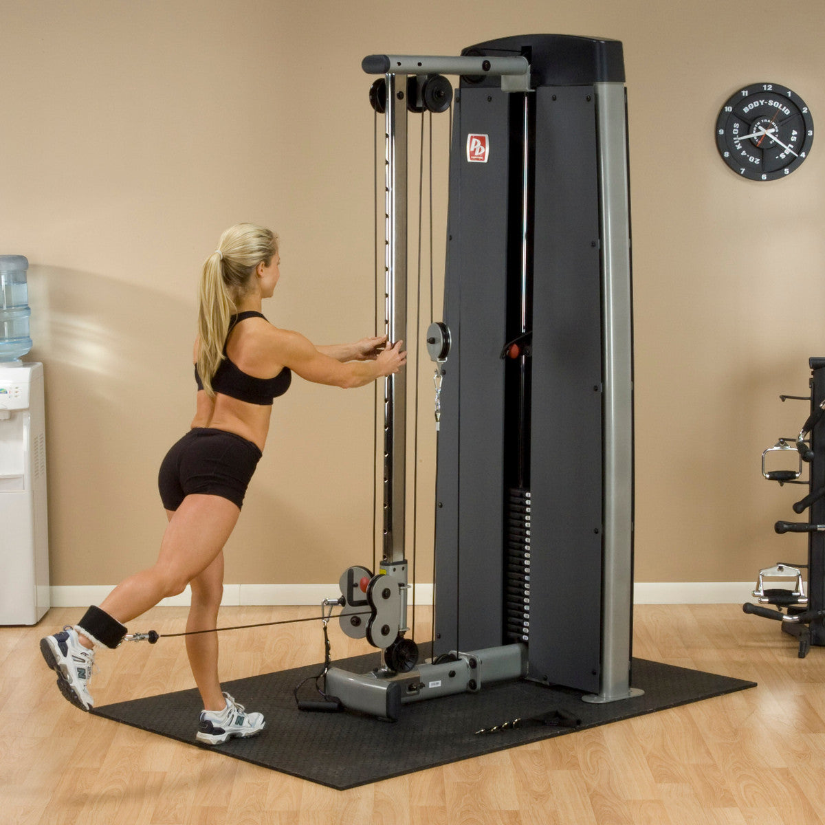 Body-Solid ProDual DPCC Cable Column Machine woman exercising