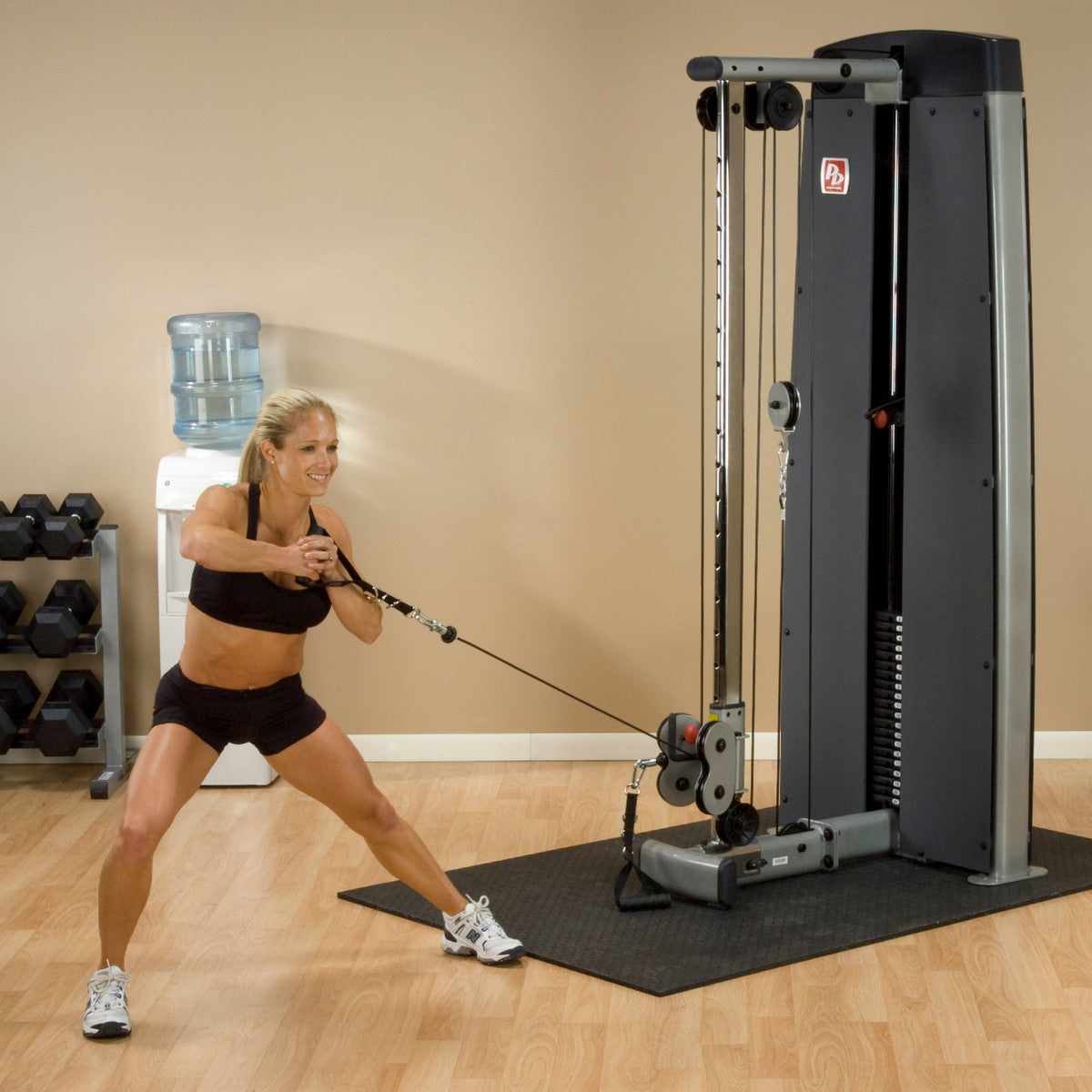 Body-Solid ProDual DPCC Cable Column Machine woman exercising