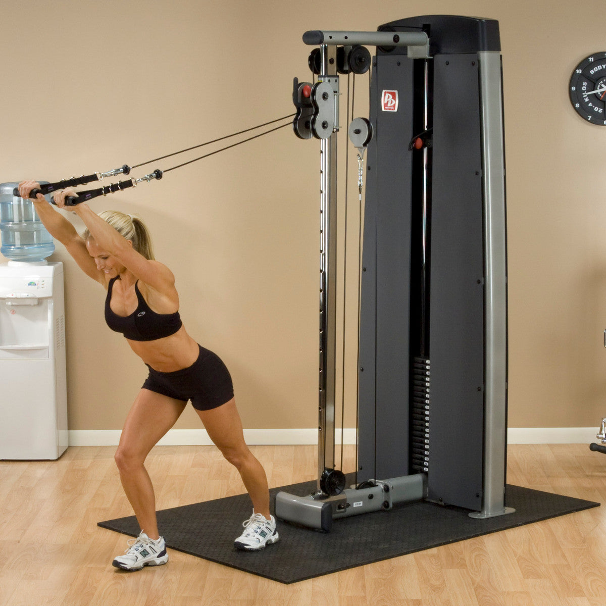 Body-Solid ProDual DPCC Cable Column Machine woman exercising