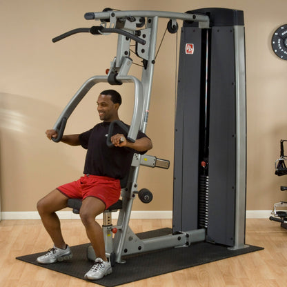 Body-Solid DPLSSF ProDual Press Arm Lat Machine man exercising