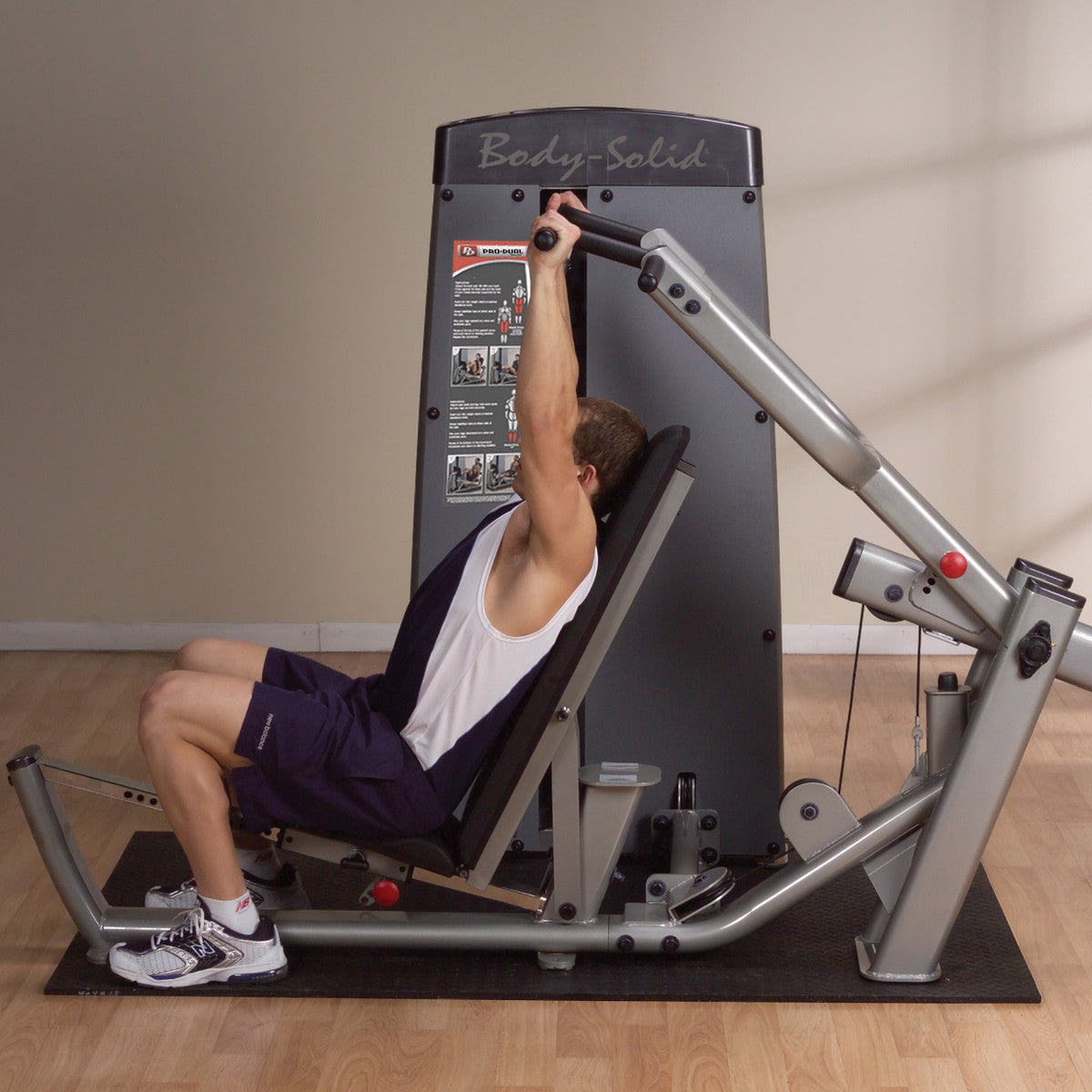 Body-Solid DPRSSF ProDual Multi Press in gym with man exercising